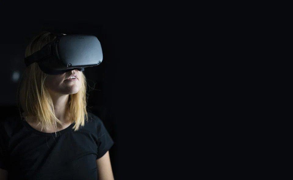 A Woman Wearing an Oculus Headset - Free Photo on Pixabay.jpg